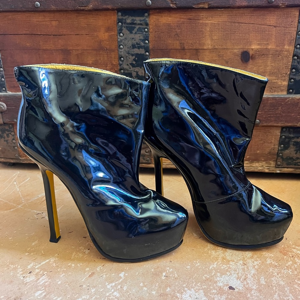 YSL patent leather boots
